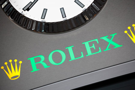 Illuminated Rolex advertising board situated inside Charles De Gaulle airport, Paris France.