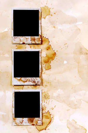 Row of old vintage stained style blank photo print frames on parchment paper backgroundの写真素材