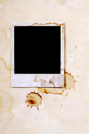 Old vintage stained style blank photo print frame on parchment paper background