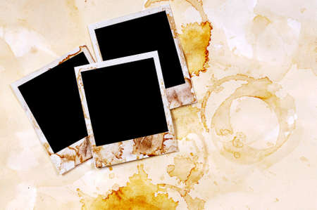 Old vintage stained style blank photo print frames on parchment paper backgroundの写真素材