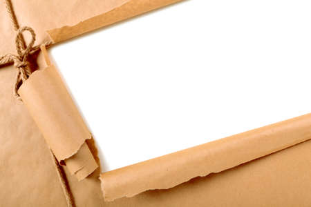 Torn brown paper package backgroundの写真素材
