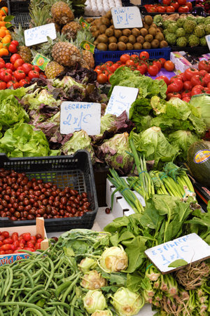Marbella, Malaga province, Andalucia, Spain - March 18, 2019 : fresh fruits and vegetables for sale in a local farmers marketのeditorial素材