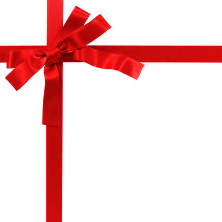 Red bow gift ribbon isolated on whiteの写真素材
