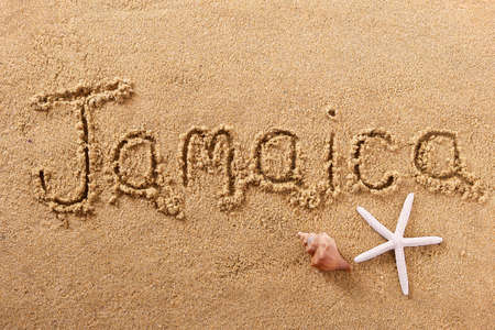 Jamaica beach word written in sand travel conceptの写真素材