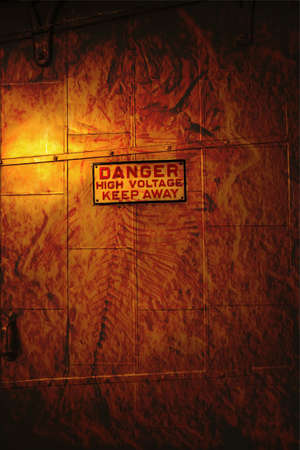 Grunge Electrical Room Steel Door with Danger Signの写真素材