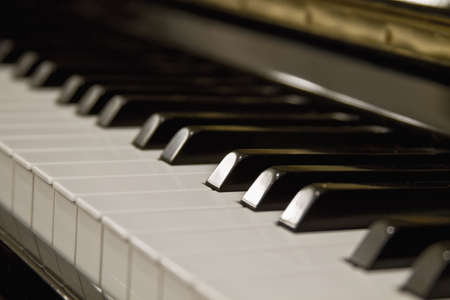 Piano Keys Close Up with Blur Backgroundの写真素材