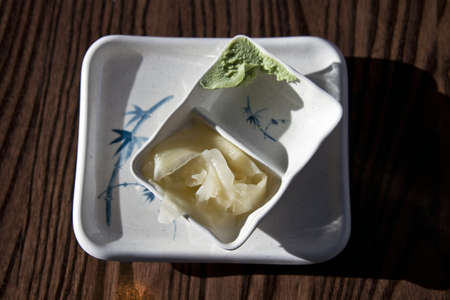 Japanese Wasabi and Ginger in Decorative Dishesの写真素材
