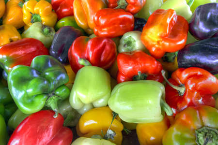 Sweet Bell Peppers Assorted Colors at Fruits and Vegetable Standの写真素材