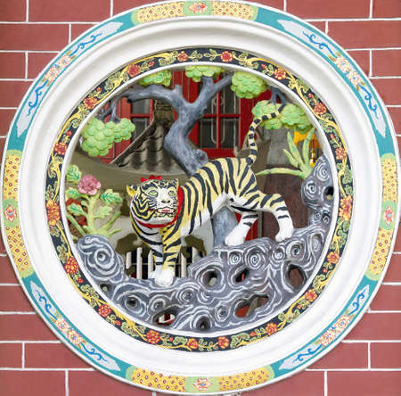 Circular Design Chinese Temple Wall Carving of Tigerのeditorial素材