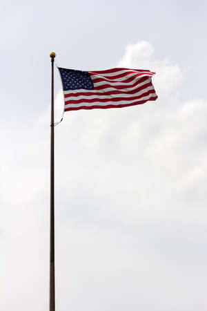 United States of America USA Flag on a pole flying against the sky
