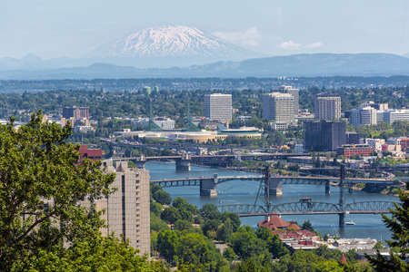 Portland Oregon downtown with bridges over Willamette River and Mount Saint Helens viewの写真素材