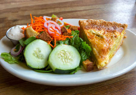 Quiche Pastry with salad and blue cheese dressing clsoeup macroの写真素材