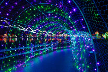 Christmas lights in tunnel along Lafarge Lake in Coquitlam British Columbia Canada at night