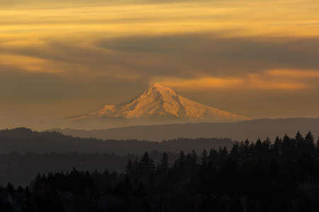 Mount Hood view from Happy Valley Oregon during a hazy sunset day in winter season
