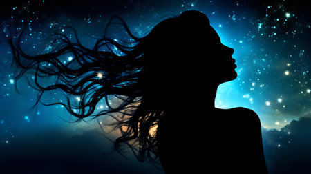 Silhouette of young woman with stars on backgroundの素材