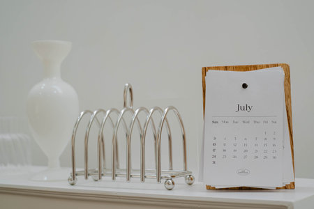 Aesthetic homemade calendar on July that made from wood and 2 other miscellaneous propertiesの写真素材