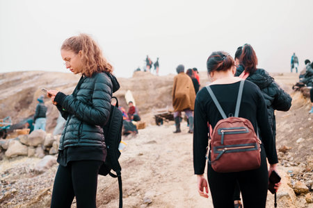 Visitors from all over the world in the Kawah Ijen or Ijen crater area with foggy conditionのeditorial素材