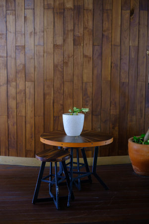 Minimalist modern cafe featuring parquet walls and floor, with contemporary decor