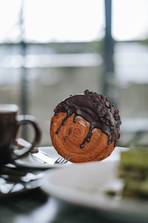 Portrait or vertical shot of a Delicious Chocolate Crombolomi with bokeh foreground and backgroundの写真素材