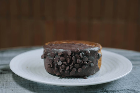 Close-up Shot of a Plate of a Chocolate Crombolomi. Blurred Background.の写真素材