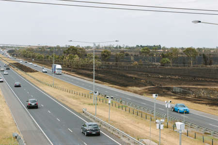EPPING, AUSTRALIA - 20 DECEMBER 2015: A day after fires swept through Epping in Melbourne, CFA Fire Crews patrol the area for spot fires as Melbourne Suffered it's hottest day in December hitting 45 degrees C.のeditorial素材