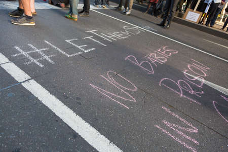 MELBOURNEAUSTRALIA - FEBRUARY 4: Refugee activists along with the Socialist Alliance and University Students, protest in Melbourne against sending children back from onshore camps to Nauru offshore centres.のeditorial素材
