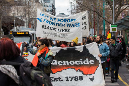 MELBOURNE/AUSTRALIA - 30 JULY , 2016: Protesters rally against the torture and detention of indigious childtren in the Northern Territory. The rally was held outside the State Library.のeditorial素材