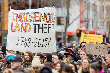 MELBOURNE/AUSTRALIA - 30 JULY , 2016: Protesters rally against the torture and detention of indigious childtren in the Northern Territory. The rally was held outside the State Library.のeditorial素材