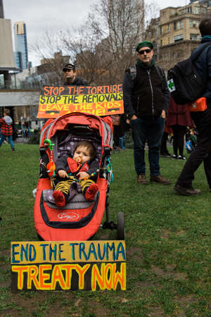 MELBOURNE/AUSTRALIA - 30 JULY , 2016: Protesters rally against the torture and detention of indigious childtren in the Northern Territory. The rally was held outside the State Library.のeditorial素材