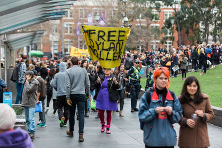 MELBOURNE/AUSTRALIA - 30 JULY , 2016: Protesters rally against the torture and detention of indigious childtren in the Northern Territory. The rally was held outside the State Library.のeditorial素材