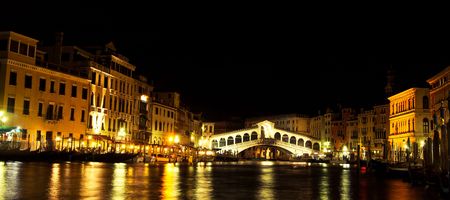At the evening around the Grand Canal, The Rialto bridge under evening lights.の写真素材
