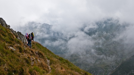 Hikers in Fagaras mountain, in ascension, to the ridge. の写真素材