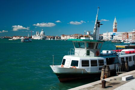Surreal atmosphere on the Grand canal and basilica Santa Maria di Salute in background, Italy, Veniceの写真素材
