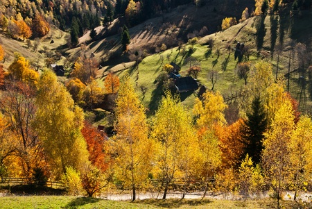 Autumn landscape in an alpine village (Romania)の写真素材