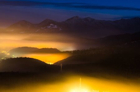 A night exposure over Brasov city with Piatra Mare mountains in the background
