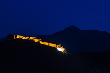 Night-view of the medieval fortress of Rasnov, Transylvaniaの写真素材