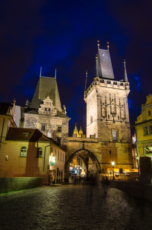 The Tower at the end of the Charles Bridge and Judith Tower, (one of the symbols of Prague)の写真素材