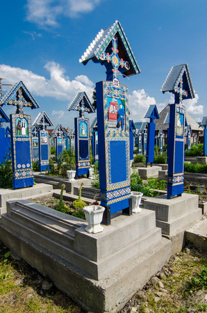 The merry cemetery of Sapanta, Maramures, Romania This is very famous and probably the most beautiful cemetery in the world  All of the graves are unique and made of wood の写真素材