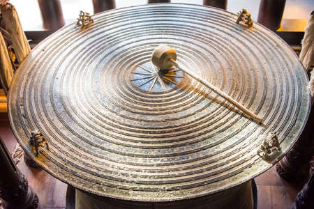 Ancient Thai gongin a budhist temple Chiang Raiの写真素材