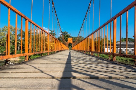 Bridge over the Nam Song River in Vang Vieng, Laos.の写真素材