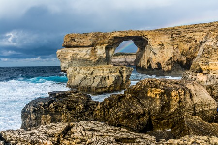 Azure window is located on the West coast of Gozo island, Dwejra is perhaps the most spectacular natural monument in Malta.の写真素材