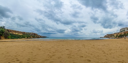 Beautiful scenery on a winter evening in Golden Bay in Malta.の写真素材