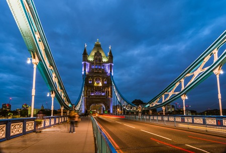 Bridge Tower night view from the bridge London United Kingdom. A combined bascule and suspension bridge which crosses the River Thames and has become an iconic symbol of London.の写真素材