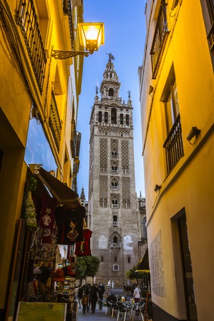 Sunset view of the Giralda tower, famous bell tower of the Cathedral of Seville, Andalusia, Spainのeditorial素材