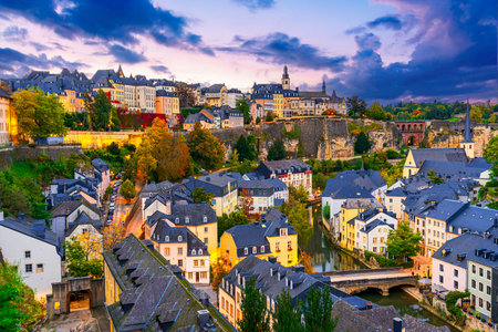 Luxembourg City: Sunset cityscape of a beautiful small EU country with the old town, Alzette River and Grund district, Europe travel destinationの写真素材