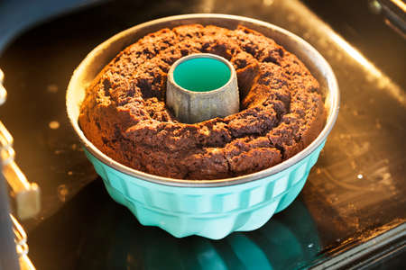 Baking the bundt cake in the ovenの写真素材