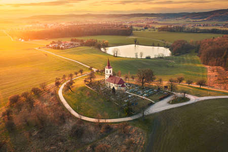 Church on the hill with sunlit landscape. Bysicky church near SPA town Lazne Belohrad, Czech Republicの写真素材