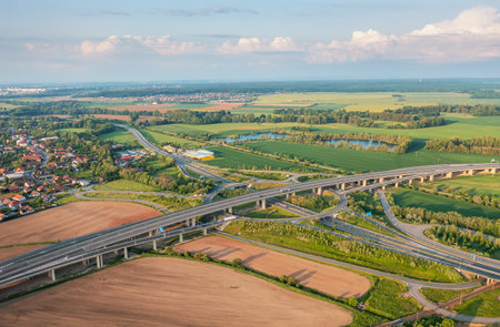 Aerial view on highway D35 crossing road No. I-37. Highway bridge with a big roundabout near Opatovice nad Labem.の写真素材
