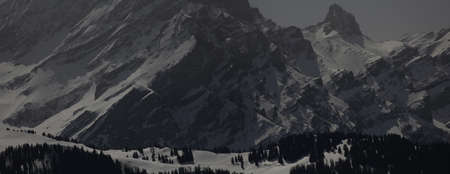 alpine winter landscape at nightの写真素材