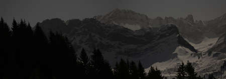 alpine winter landscape at nightの写真素材